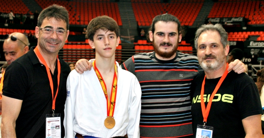 Jorge Martínez Bronce en el Campeonato de España con sus entrenadores