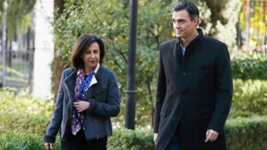 Margarita Robles y Pedro Sánchez